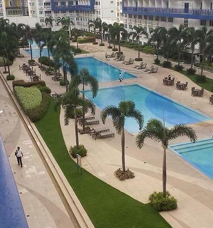 Cnholy Condo At Sea Residences Manila Esterno foto