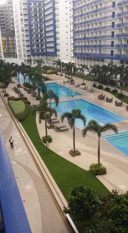 Cnholy Condo At Sea Residences Manila Esterno foto